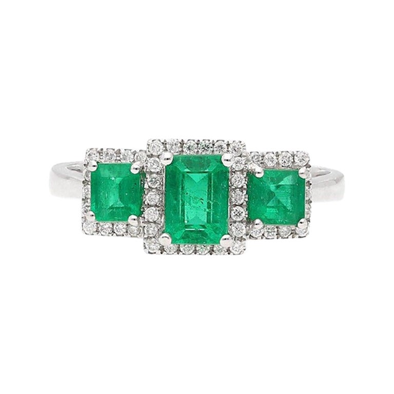 Colombian Emerald, Diamond, and 18 Karat White Gold Three-Stone Ring