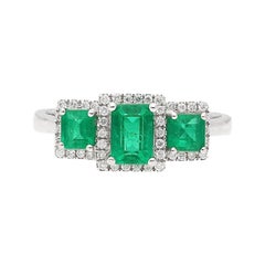 Colombian Emerald, Diamond, and 18 Karat White Gold Three-Stone Ring