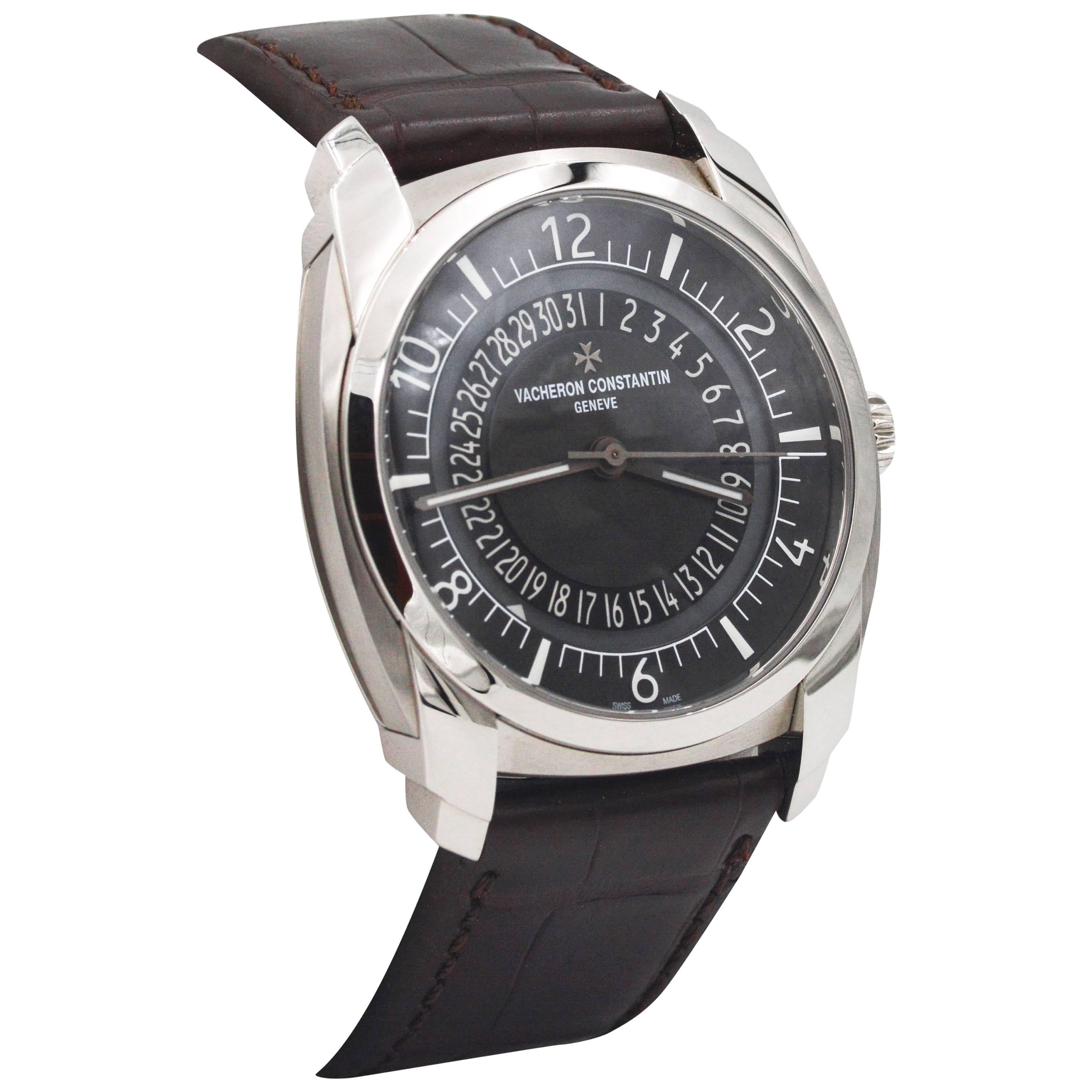 This Vacheron Constantin Quai De L'ILE watch is crafted in stainless steel cushion shaped case that measure 41 mm.  Vacheron finished this time piece with a handsome black dial with contrasting white Arabic numerals and dial indices.  The dial also