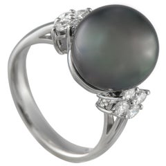 Bague en platine 0,38 ct de diamant et perle