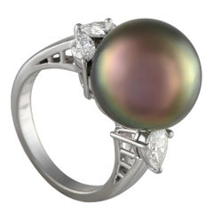 Bague en platine 0,88 ct de diamant et perle