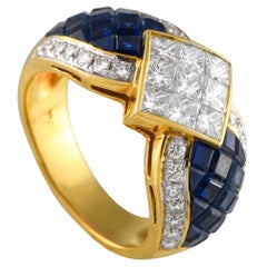 Bague en or jaune 18K avec 1,64ct de diamant et saphir en serti invisible