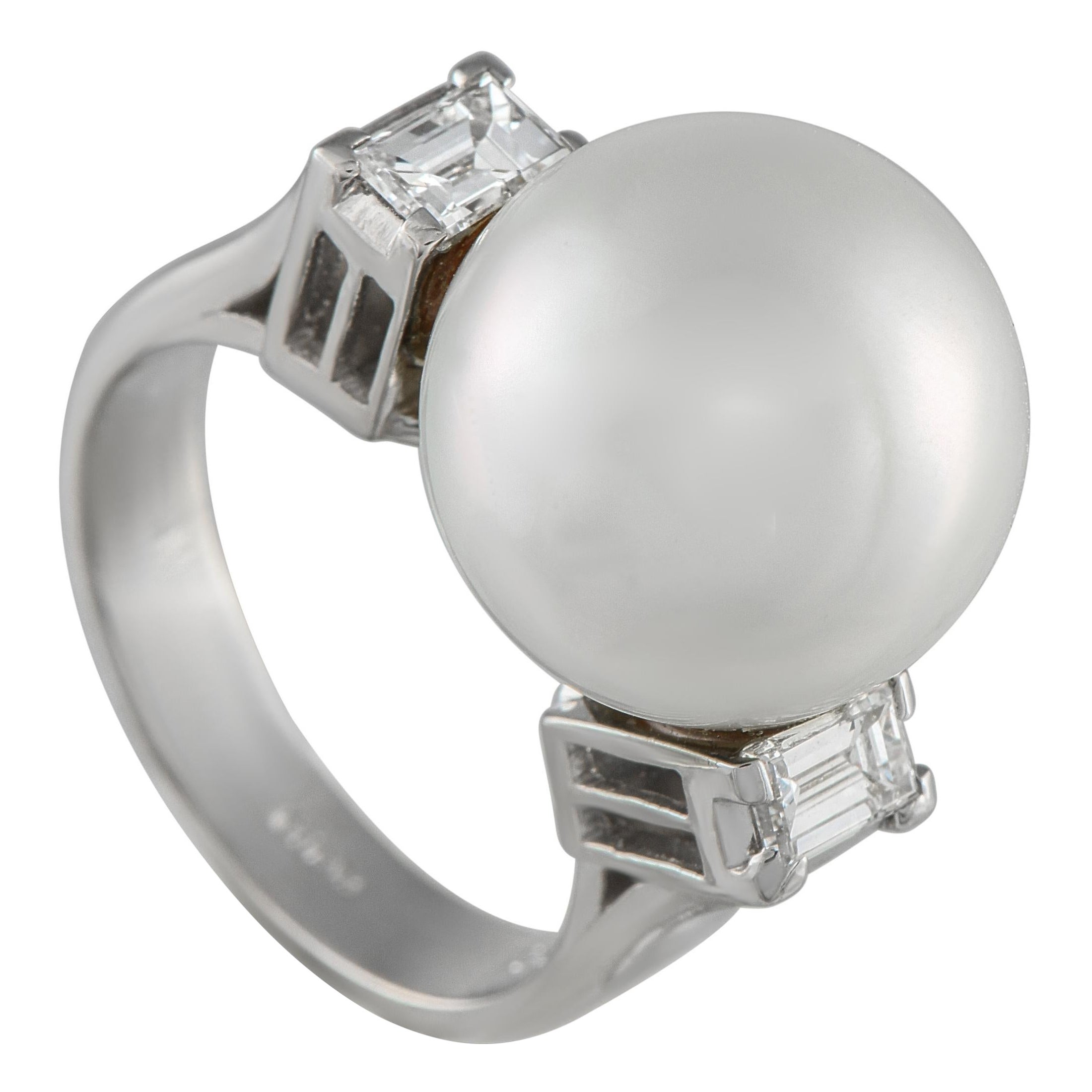 Boucles d'oreilles en platine avec perles et diamants de 0.68ct en vente