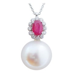 12 Mm Pearl, Diamonds, Rubies, 18 Karat White Gold Pendant Necklace.