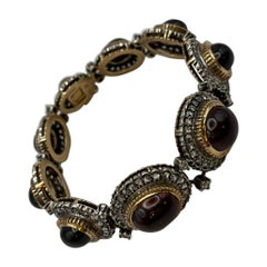 Bracciale stile retrò in oro giallo ed argento, con rose di diamanti e granate