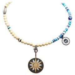 CLARISSA BRONFMAN Blue Asymmetrical Necklace & Ebony Sun Star Two Tone Pendant