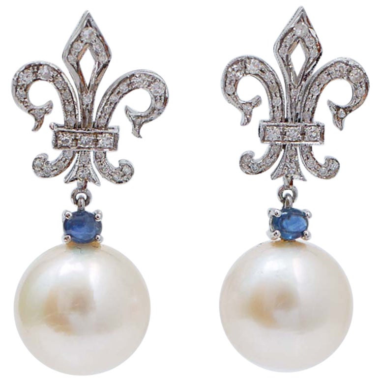 14 Mm Pearls, Sapphires, Diamonds, 14 Karat White Gold Earrings. For Sale