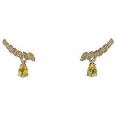 Yellow sapphires and diamonds earrings studs