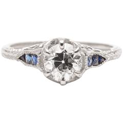 Heart Motif 0.65 Carat Diamond and Sapphire Engagement Ring in Platinum