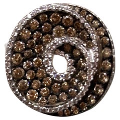 Colored Diamond and White Diamond Spiral Ring set in 18k White Gold