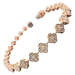 Bracciale tennis stile trifoglio con diamanti in oro rosa 18k