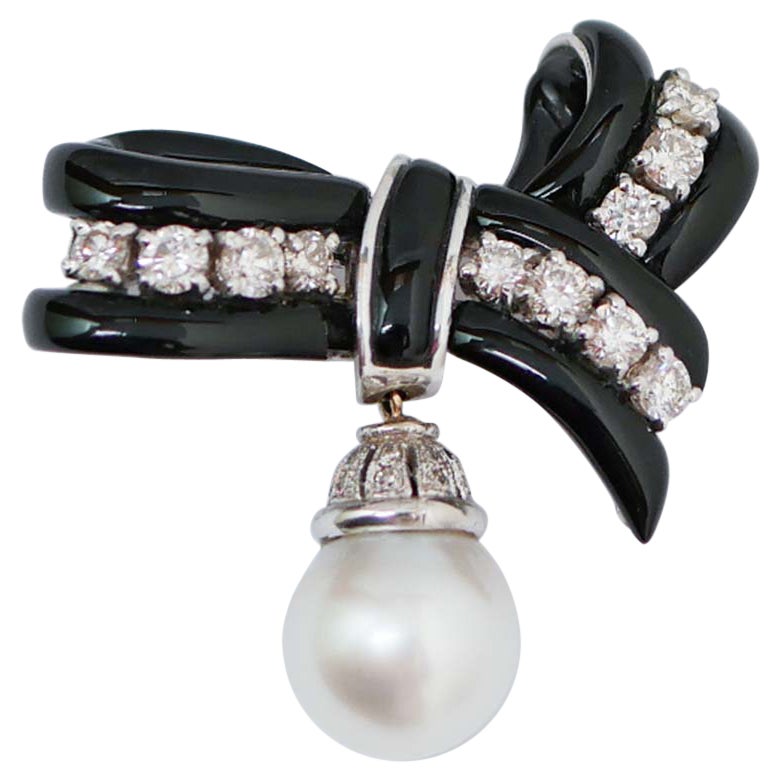 South-Sea Pearl, Onyx, Diamonds, 14 Karat White Gold Ribbon Brooch. For Sale