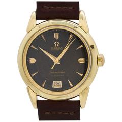 Vintage Omega Yellow Gold Seamaster Calendar Chocolate Wristwatch Model 2627, circa 1950