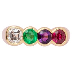 Anello Acrostico in oro 18k con diamante, smeraldo, ametista e rubino