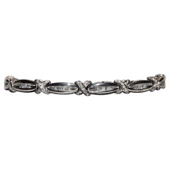 Bracciale decorato con diamanti naturali in oro bianco 18 carati, vintage, anni '80, circa.