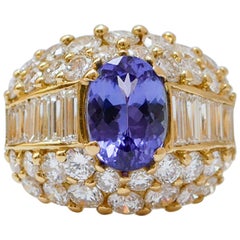 Anello con tanzanite, diamanti e oro giallo 18 carati.