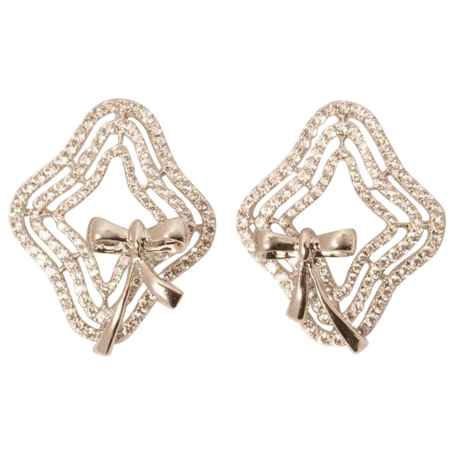 Pendientes de oro macizo de 14 quilates con diamantes en forma de lazo (certificados) en venta