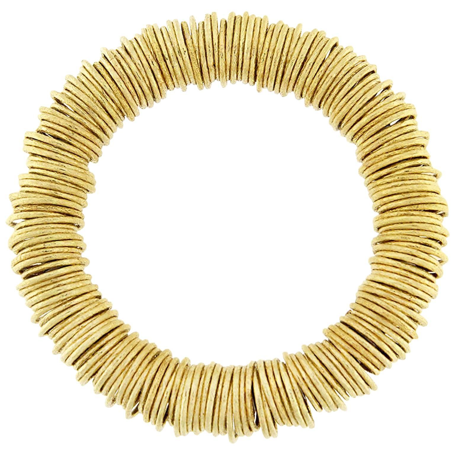 Alex Jona 18 Karat Yellow Gold Multiple Ring Bangle Bracelet For Sale