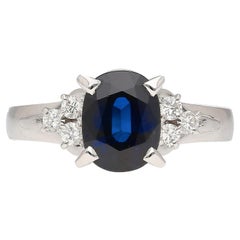 Anello in filigrana di platino con zaffiro blu taglio ovale e diamante da 1,58 carati