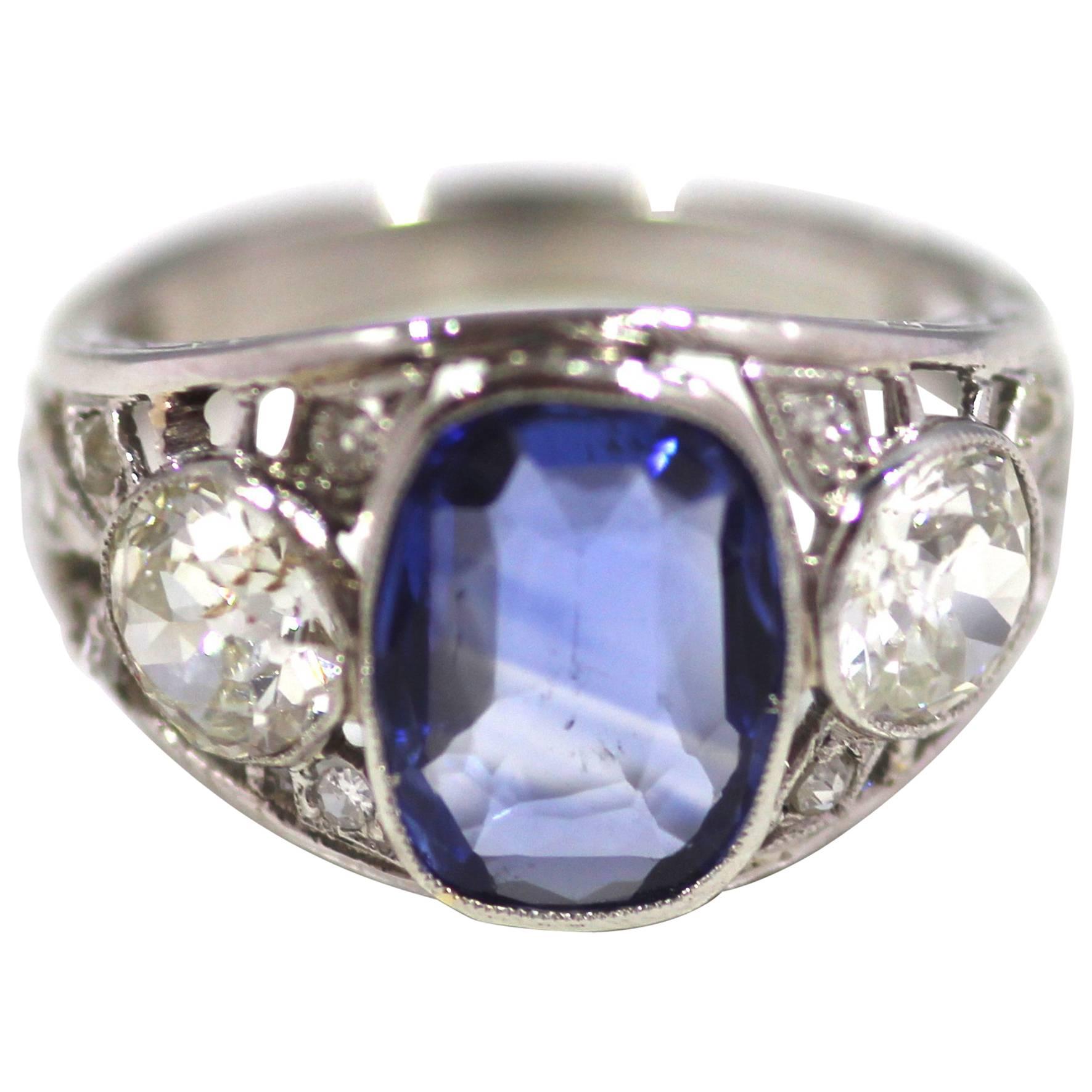 1920 Art Deco Cushion Cut Sapphire and Diamond Three-Stone Cluster Ring For Sale