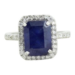 Bague en or massif 14k avec saphir bleu et diamant en halo (certifié)
