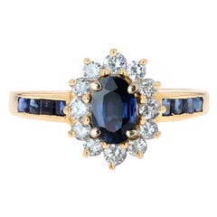 Anello moderno con zaffiro e diamanti in oro giallo 18 carati a forma di margherita