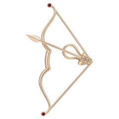 Artemis’ Bow Earring (left), 18-carat red gold rubies and diamonds