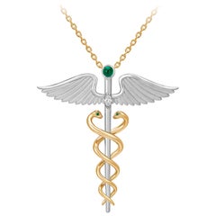 Hermes' CaduceusAnhänger, 18 Karat Weiß- und Gelbgold, Smaragde und Diamanten