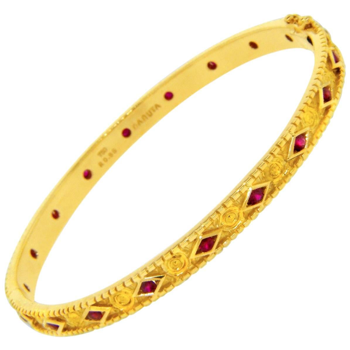 .95 Carat Ruby Yellow Gold Celtic Carving Design Bangle Bracelet For Sale