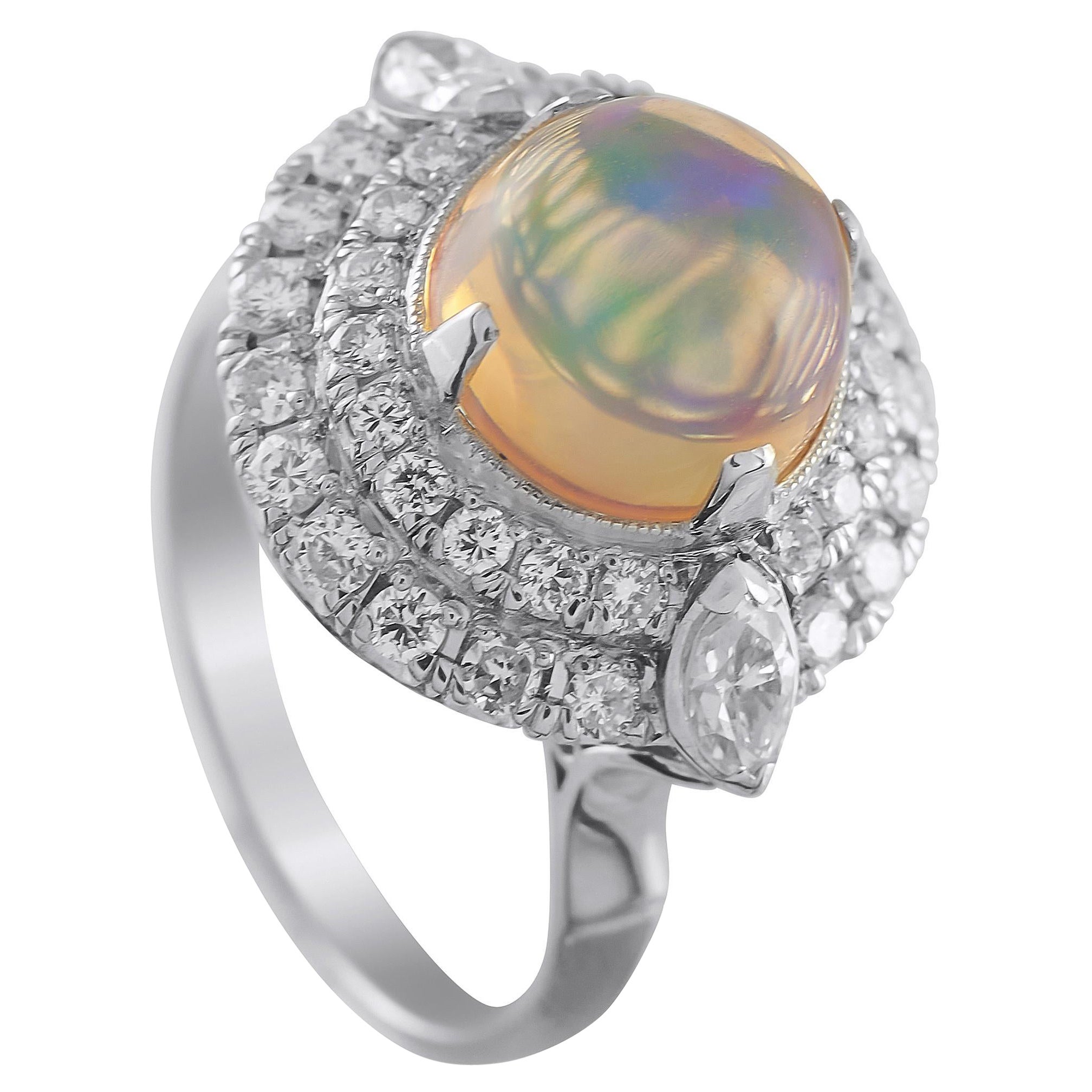 Anello in platino con diamante e opale da 1.05 carati in vendita
