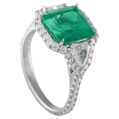 Kwiat Platinum 1.0ct Diamond and Emerald Ring