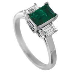 Platinum 0.38ct Diamond and Emerald Ring