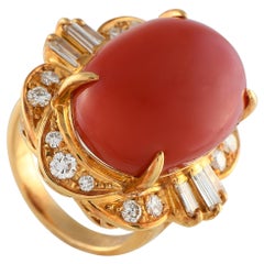 Anello in oro giallo 18 carati con diamante e corallo da 0,97 carati