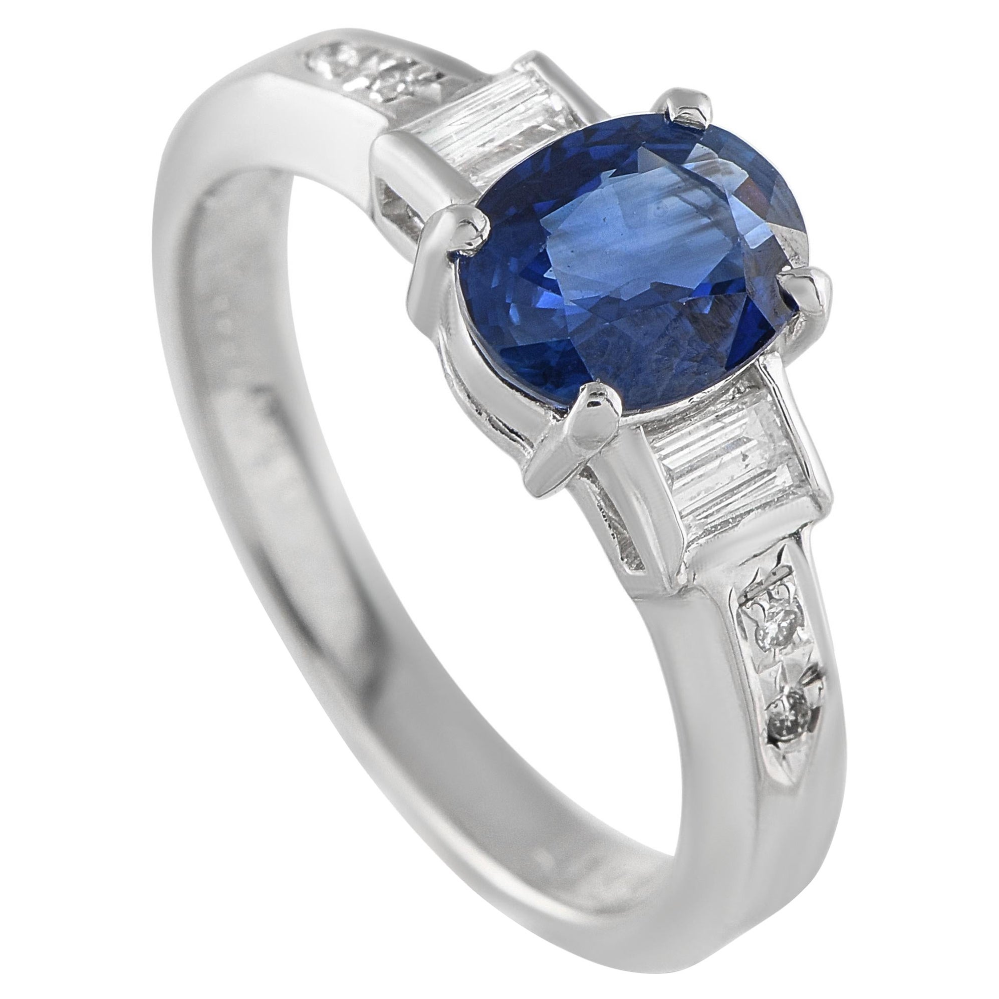 Anello in platino con diamante e zaffiro da 0,16 carati