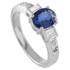 Anello in platino con diamante e zaffiro da 0,16 carati
