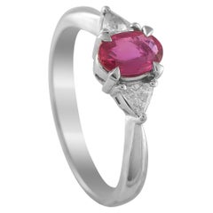 Platinum 0.22ct Diamond and Ruby Three-Stone Ring