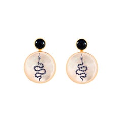 Schlangenohrringe in Schwarz und Weiß mit Onyx und Perlmutt