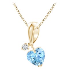 Ciondolo Angara con acquamarina naturale a forma di cuore e diamante in oro giallo 14 carati