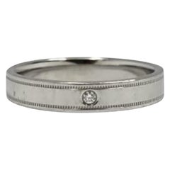 Tiffany & Co. Anillo de hombre de platino con banda Milgrain Diamante a ras