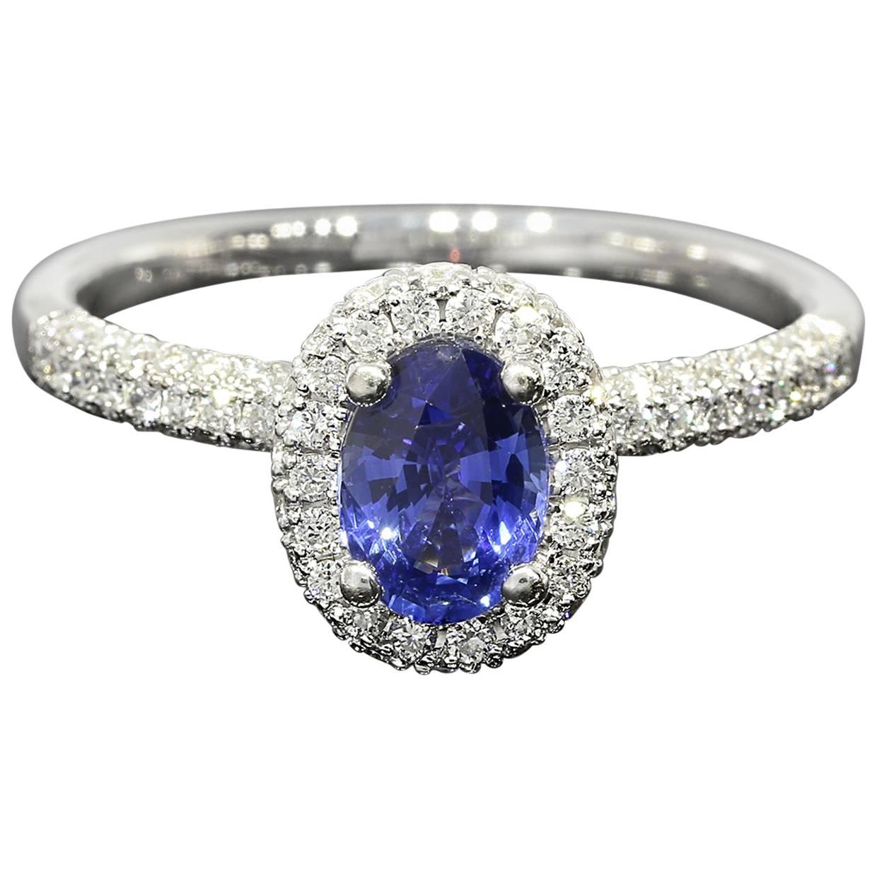 White Gold Oval Sapphire and Diamond Certified Halo Engagement Ring