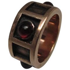 Arts and Crafts Garnet Cabochon Gold Band Ring