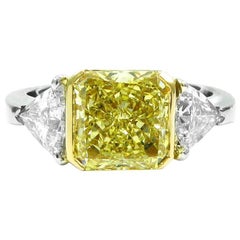 GIA Certified 3.23 Carat Fancy Yellow and White Diamond Gold Three-Stone Ring