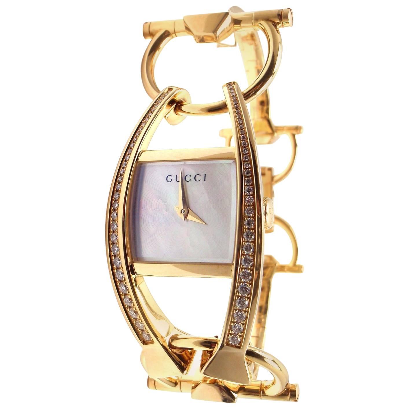 Gucci Ladies Yellow Gold Diamond 123 Chiodo Wristwatch Ref YA123506 at  1stDibs | guciiiitt123