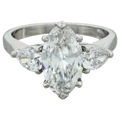 Gorgeous Platinum 3.05 Carat Oval and Pear Diamond Engagement Ring EGL