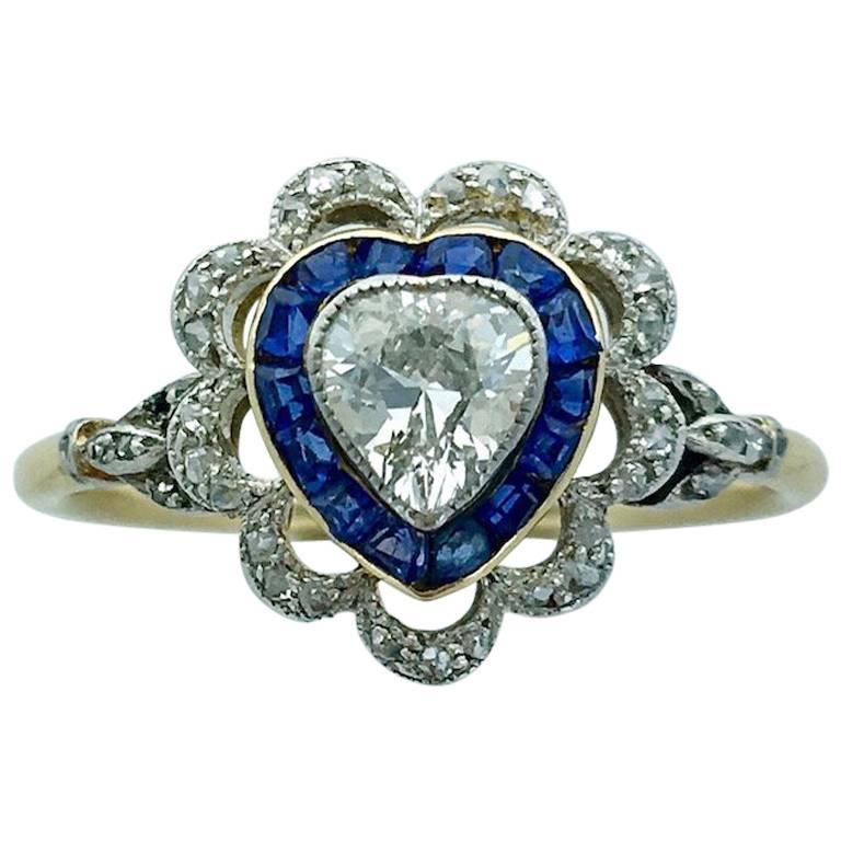 French 1900s Heart Shape Diamond Calibrated Sapphire Gold Platinum Ring