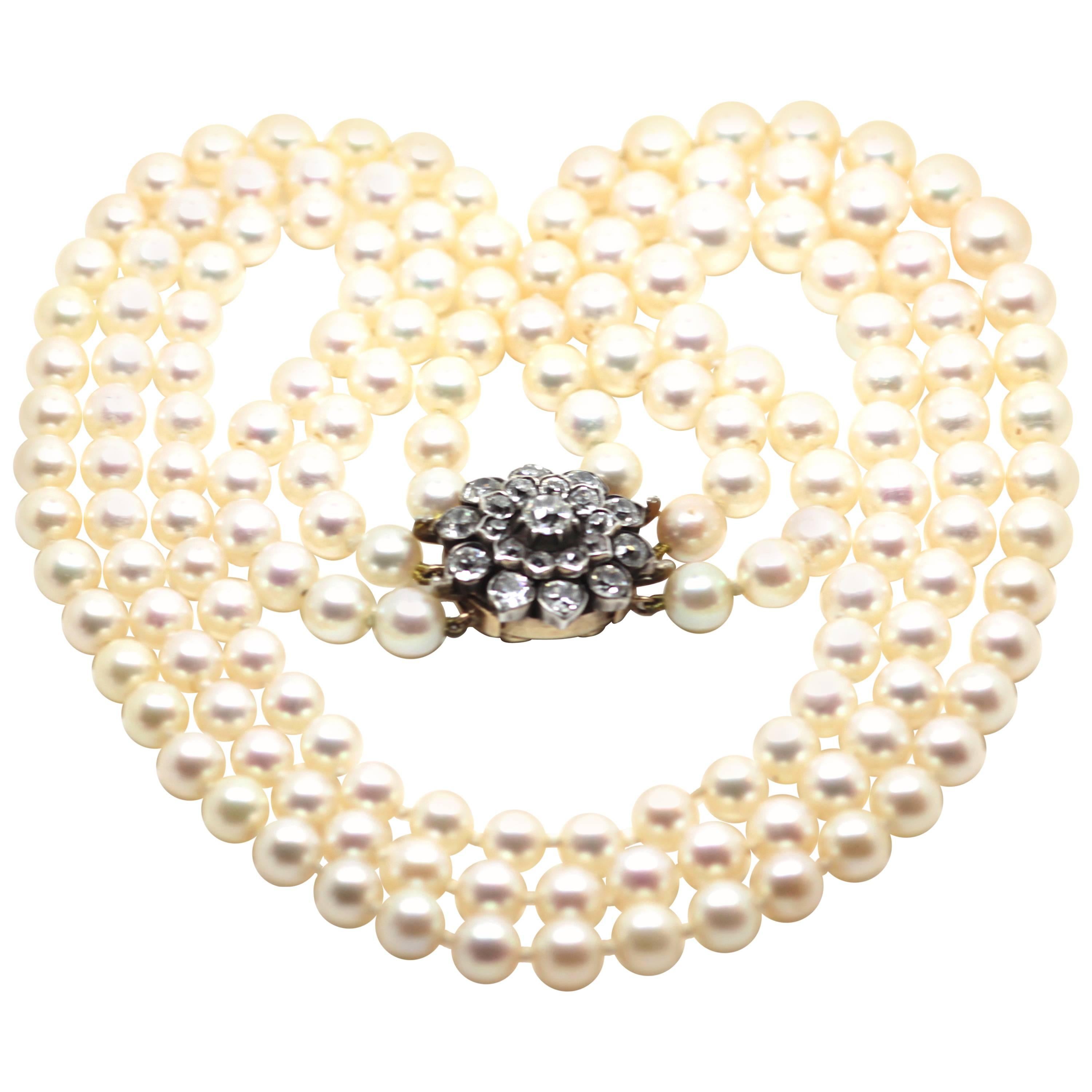 1920's Art Deco Triple Strand Pearl Necklace with Antique Diamond Clasp For Sale