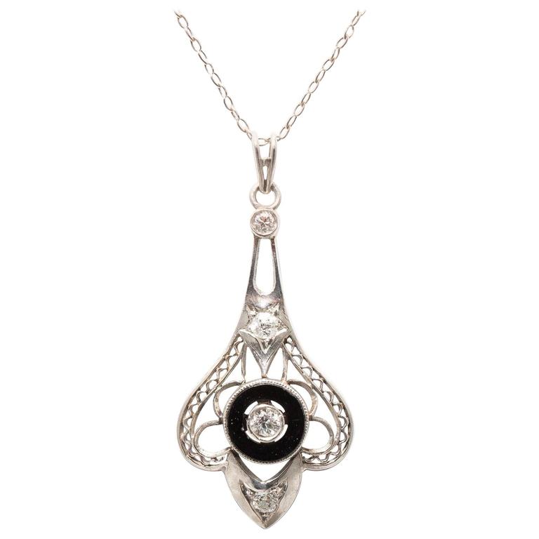 Platinum Art Deco Onyx and European Cut Diamond Pendant Necklace at 1stDibs