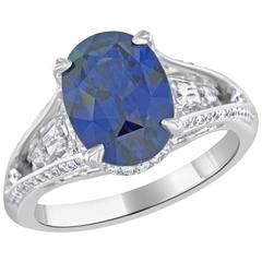 5.16 Carat Oval Sapphire and Diamond Platinum Ring