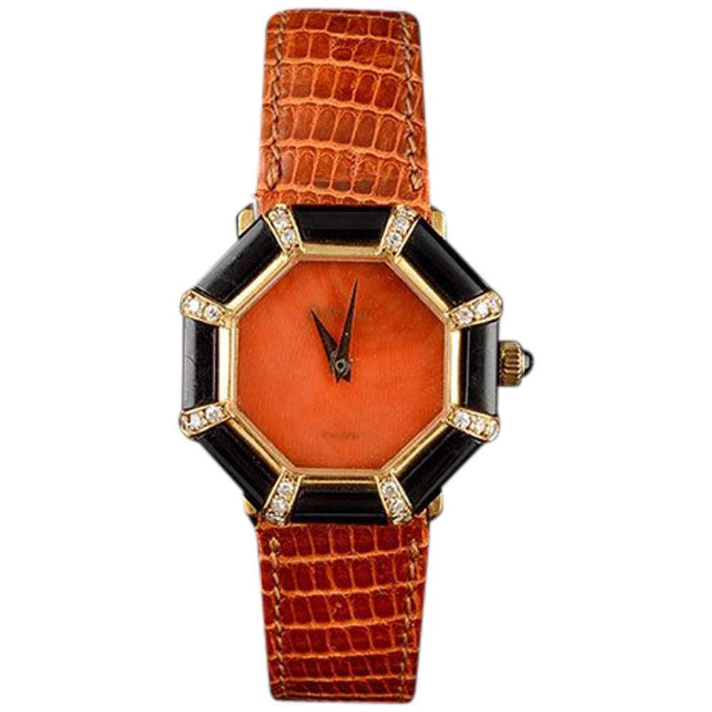 Delaneau in 18 Karat Yellow Gold, Onyx, Diamonds and Coral Dial, circa 1980 For Sale