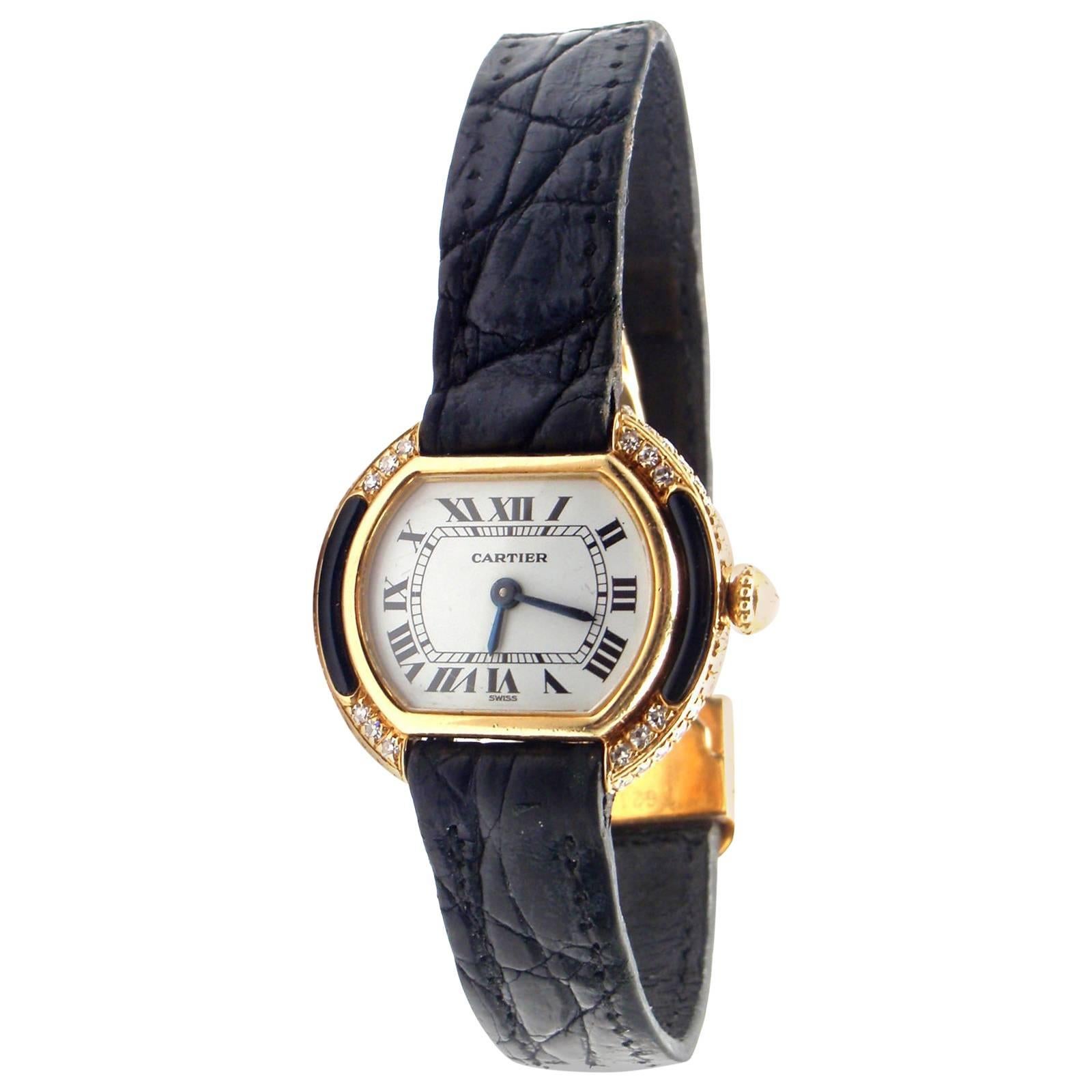 Cartier Ladies Yellow Gold Diamond Ellipse Black Onyx Manual Wind Wristwatch